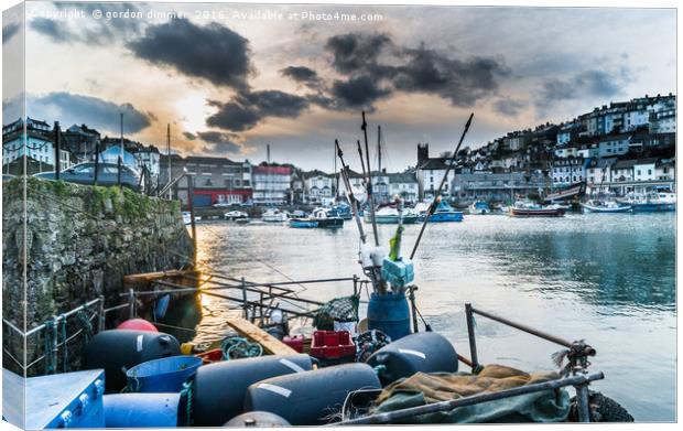 Brixham Harbour with Fishing Equipment Canvas Print by Gordon Dimmer