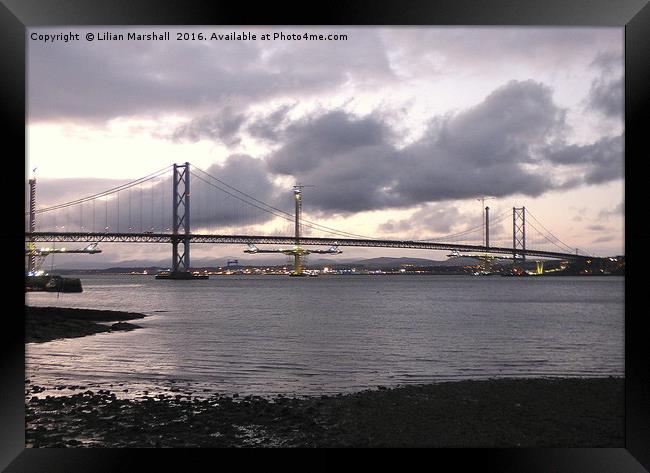 Dusk over the Forth Road Bridge. Framed Print by Lilian Marshall