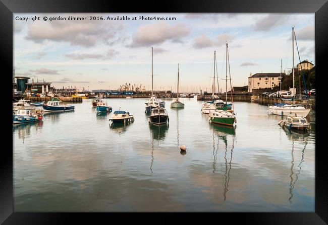 Reflections of Brixham Harbour Framed Print by Gordon Dimmer