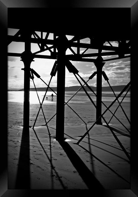 Beneath The Pier Framed Print by graham young