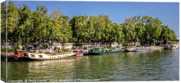 Houseboats on the River Seine Canvas Print by Naylor's Photography