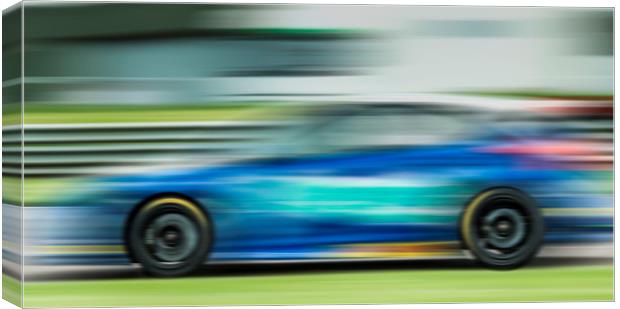 Racing car motion blur  Canvas Print by Shaun Jacobs