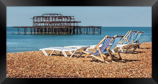 Brighton Beach West Pier Deckchairs. Framed Print by Len Brook