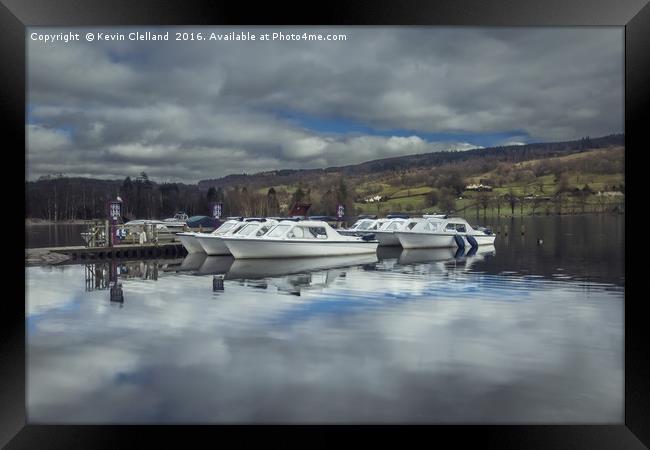 Boats anchored at Coniston Lake Framed Print by Kevin Clelland
