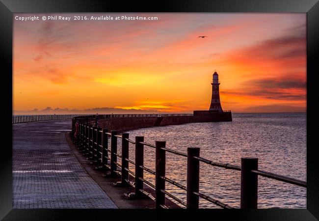 Sunrise at the pier Framed Print by Phil Reay