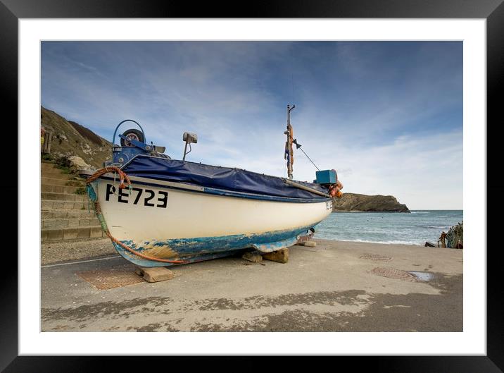 Lulworth cove fishing boat  Framed Mounted Print by Shaun Jacobs