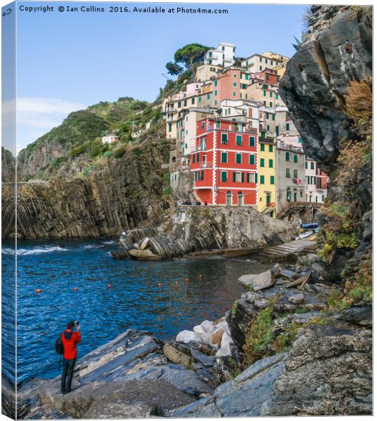 Taking Pictures of Riomaggiore Canvas Print by Ian Collins