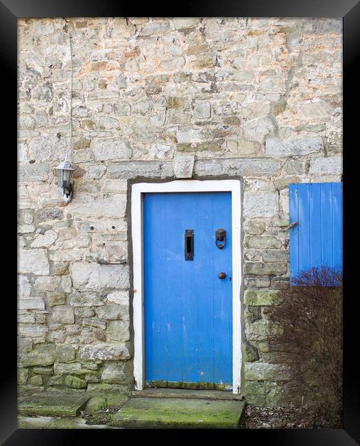 Old Blue Door Framed Print by Shaun Jacobs