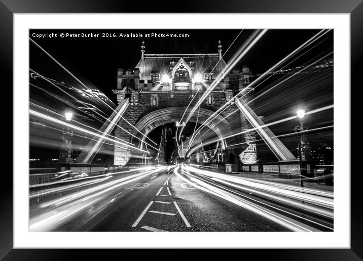 Light Trails in Monochrome. Framed Mounted Print by Peter Bunker