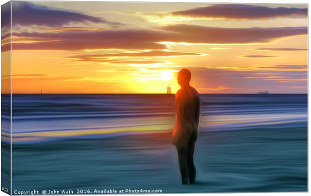 A Gormley Iron man at sunset Canvas Print by John Wain