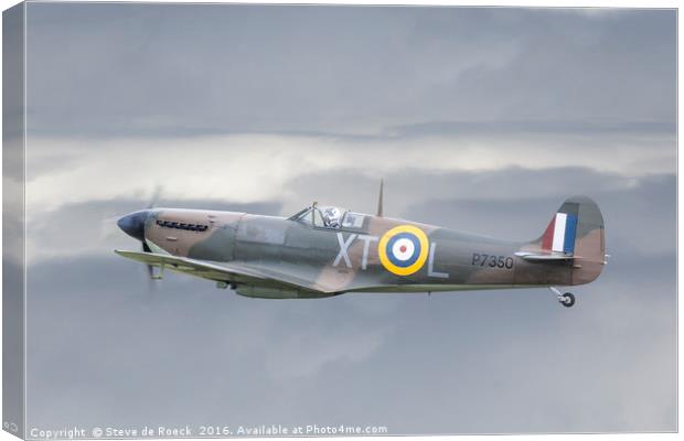Supermarine Spitfire Above The Clouds Canvas Print by Steve de Roeck