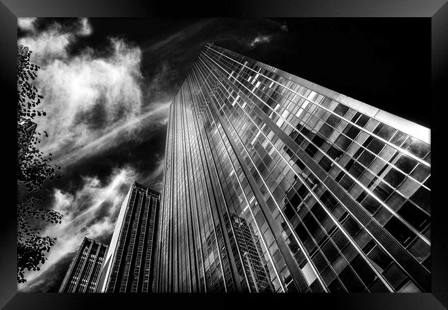 Towers and clouds Framed Print by David Hare