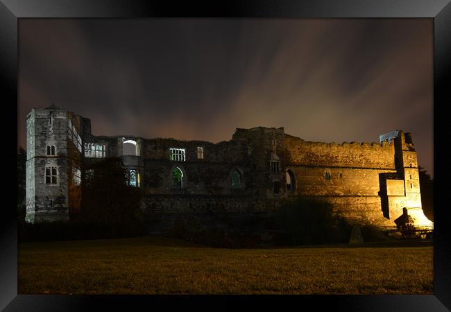 Newark Castle backlit at night Framed Print by Paul Phillips