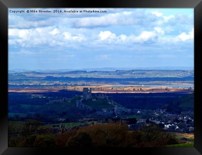 Corfe Castle and beyond. Framed Print by Mike Streeter