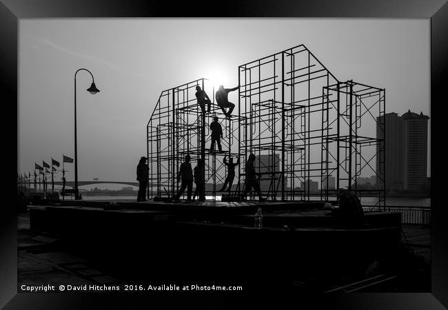 Black and white Scaffolding erectors Framed Print by David Hitchens