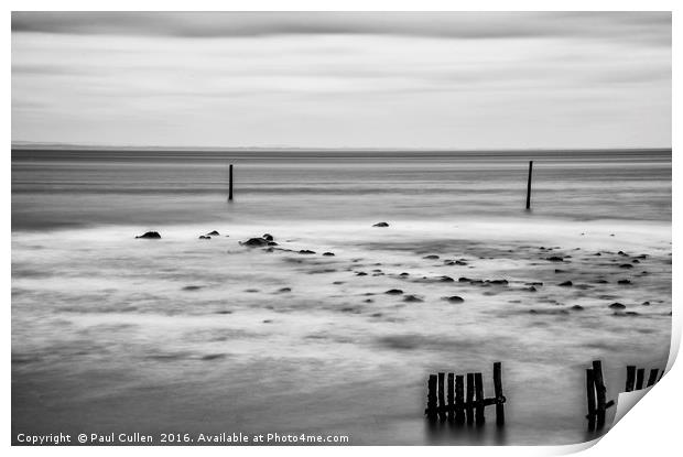 Wooden posts in the sea. Monochrome. Print by Paul Cullen