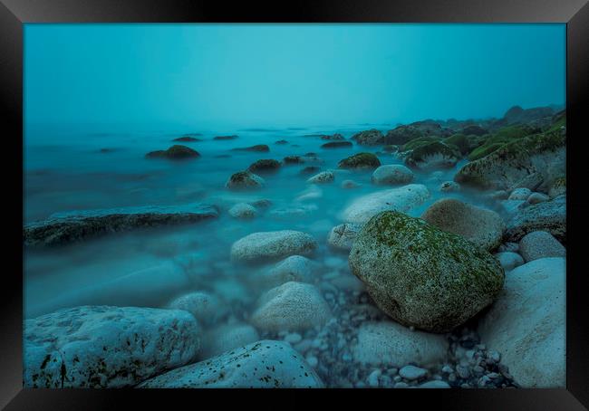 Rocks on the Beach on a misty morning Framed Print by Shaun Jacobs