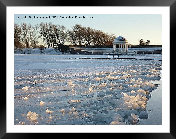 Frozen boating Lake.  Framed Mounted Print by Lilian Marshall