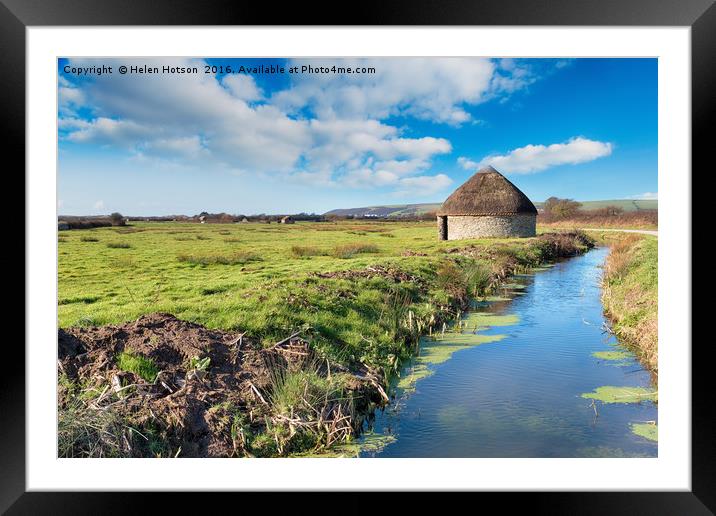 A thatched circular linhay or barn on Braunton Mar Framed Mounted Print by Helen Hotson