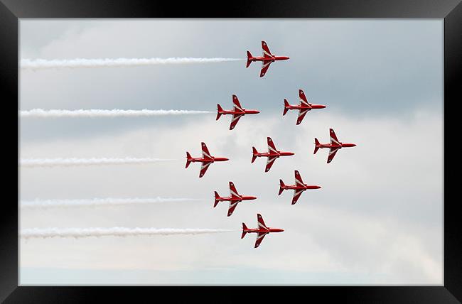 Red Arrows flying in diamond formation Framed Print by Simon Marshall