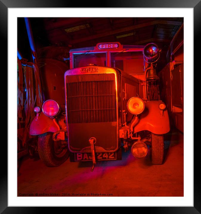 vintage Fire engine bathed in red light Framed Mounted Print by andrew blakey