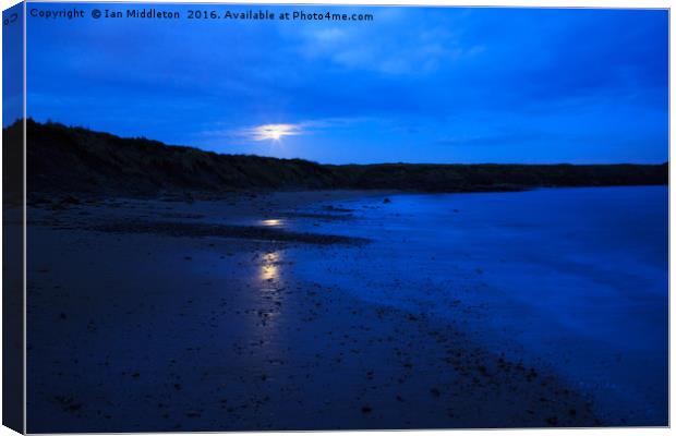 Moon rising over Whitley Bay Canvas Print by Ian Middleton