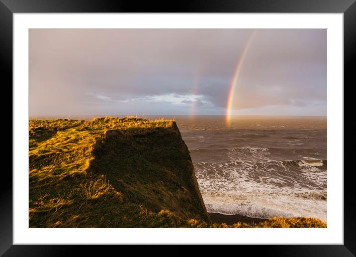 Rainbow and stormy sky at sunset. Sheringham, Norf Framed Mounted Print by Liam Grant