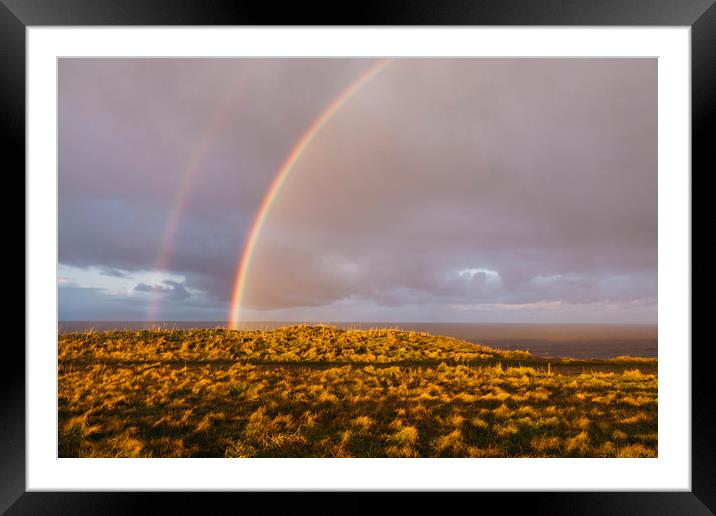 Rainbow and stormy sky at sunset. Sheringham, Norf Framed Mounted Print by Liam Grant