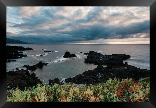 Volcanic coastline at sunrise. La Palma, Canary Is Framed Print by Liam Grant