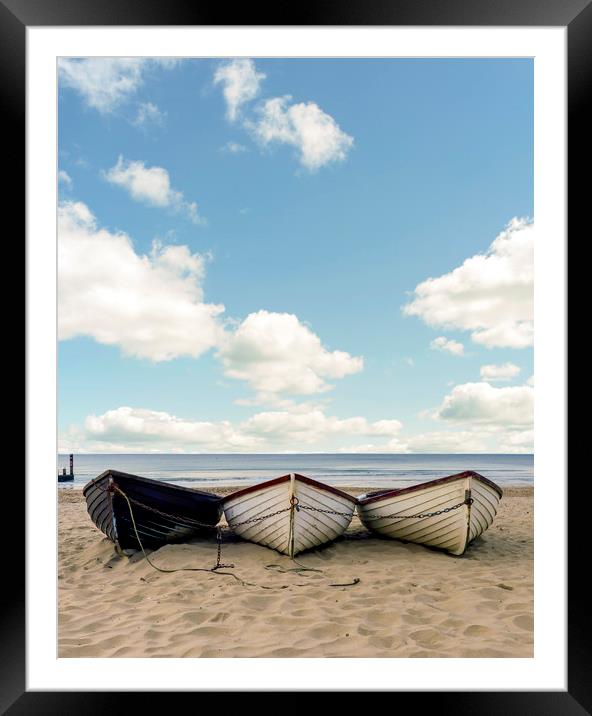 Fishing boats on a beach  Framed Mounted Print by Shaun Jacobs