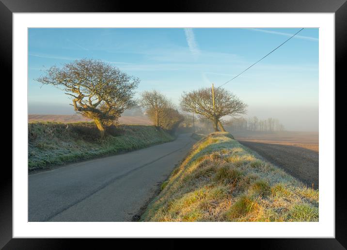 Winding Road In Mist Framed Mounted Print by Michael Brookes