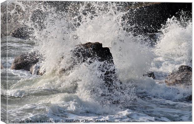 Rough Sea breaking over rocks Canvas Print by Rosie Spooner