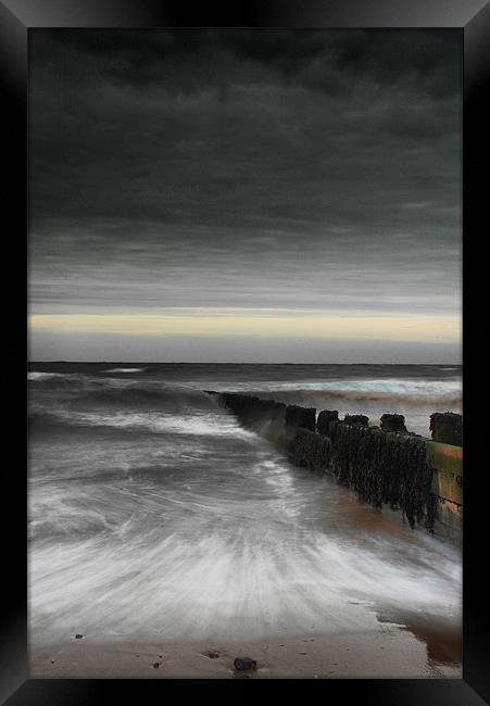 A Groyne on Cromer Beach Framed Print by Simon Gladwin