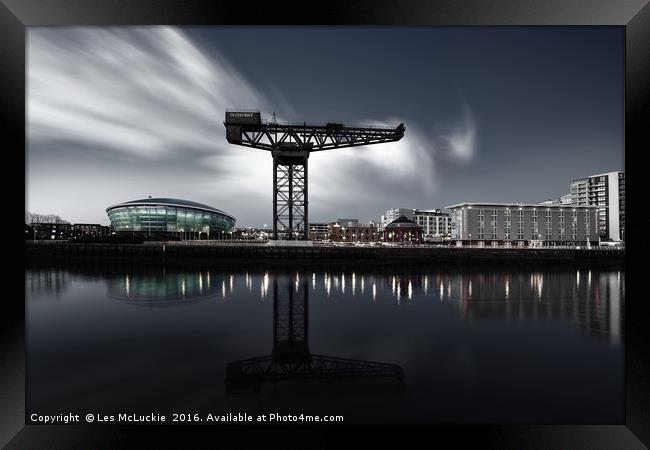 Glasgows Illuminated Nighttime Skyline Framed Print by Les McLuckie
