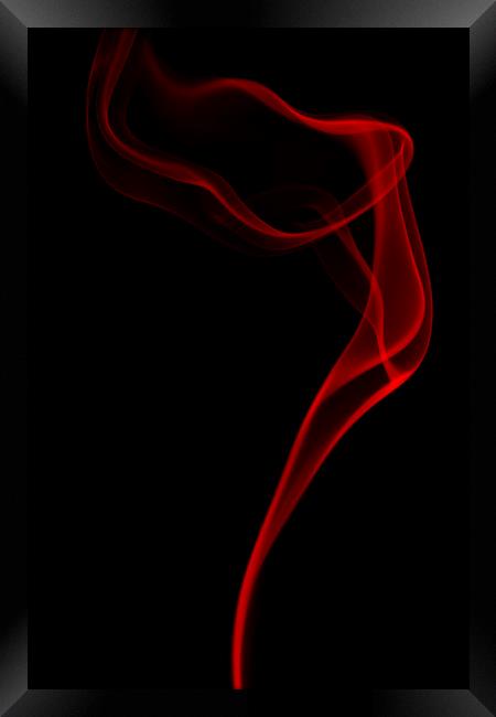 Red smoke on black background Framed Print by Sonia Packer