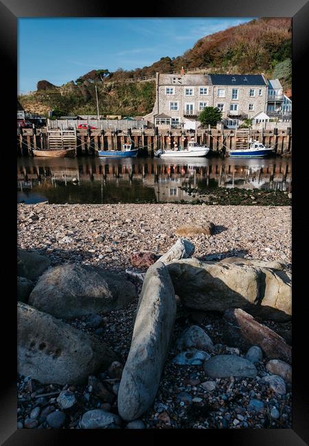 Boats moored in the harbour at Seaton. Devon, UK. Framed Print by Liam Grant