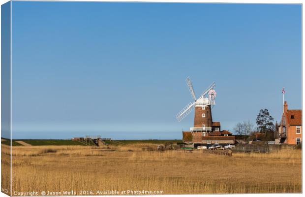 Cley Windmill next to the Salt marshes Canvas Print by Jason Wells