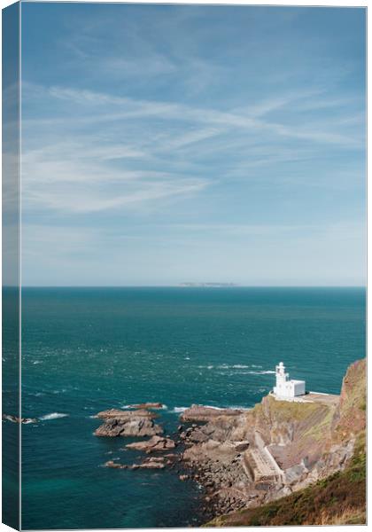Lighthouse at Hartland Quay with Lundy Island beyo Canvas Print by Liam Grant