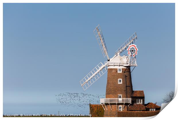 Flock of birds take to the skies behind Cley windm Print by Jason Wells