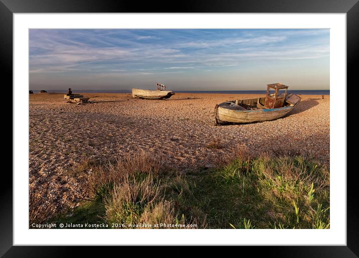 Beach with old fishing boats Framed Mounted Print by Jolanta Kostecka