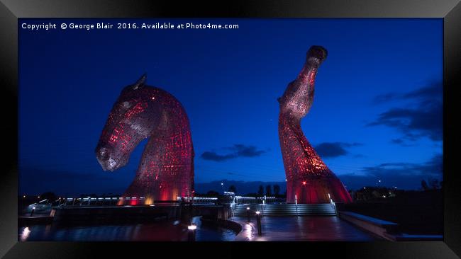 The Kelpies Light show Framed Print by George Blair
