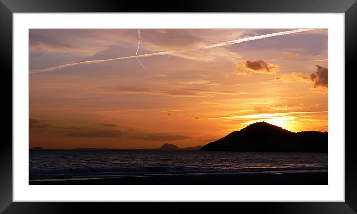 White trails in the sunset Framed Mounted Print by Lawson Jones