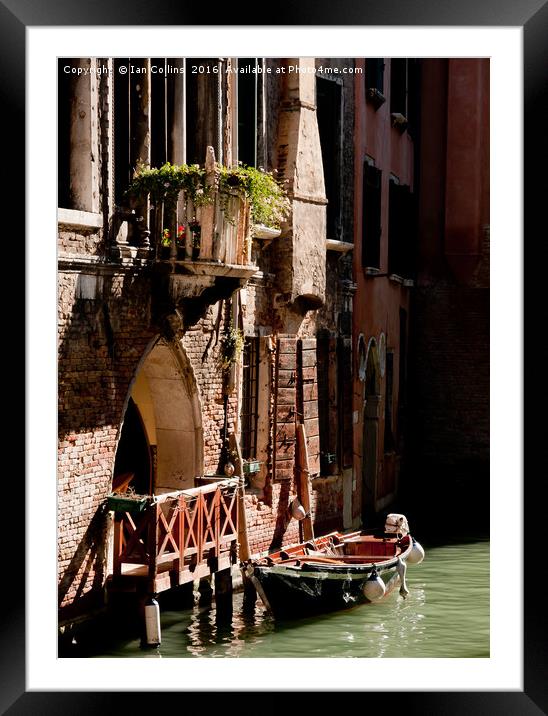 Boat moored on a Canal, Venice Framed Mounted Print by Ian Collins