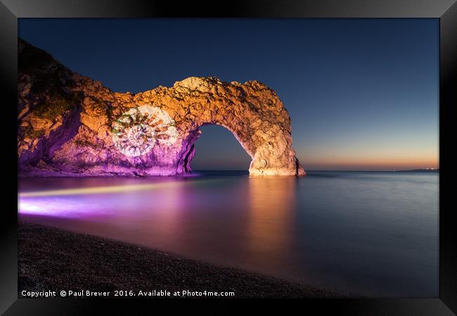 Durdle Door at Night with Illumination Framed Print by Paul Brewer