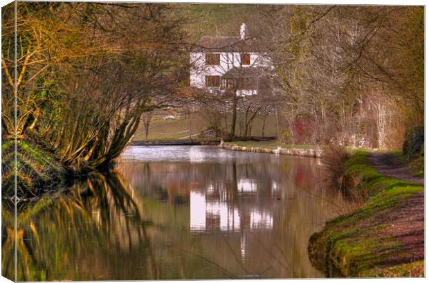 Reflections along the canal. Canvas Print by Irene Burdell