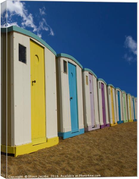 Beach huts  Canvas Print by Shaun Jacobs