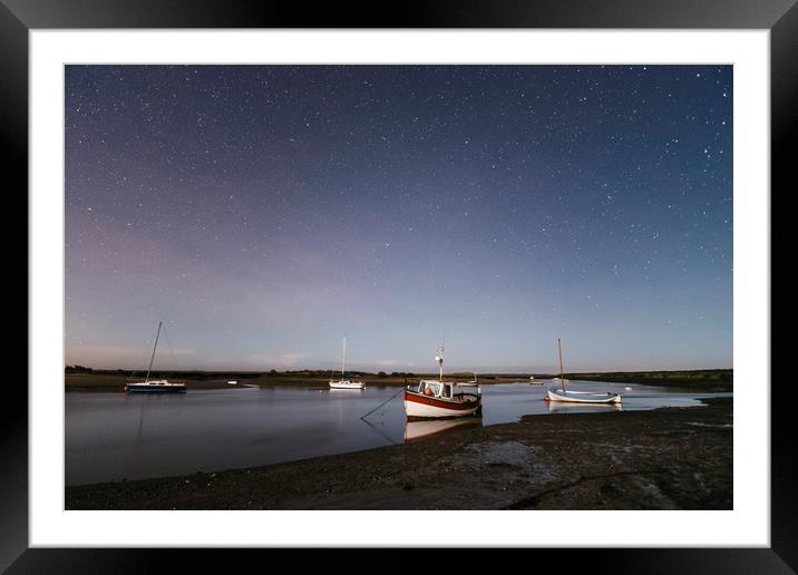 Boats under stars on a moonlit night. Burnham Over Framed Mounted Print by Liam Grant