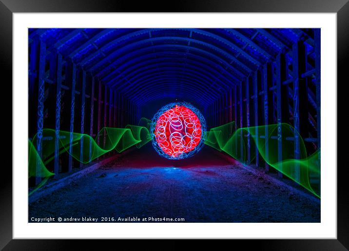 red orb deep under newcastle city streets in a old Framed Mounted Print by andrew blakey