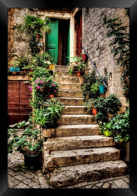 Courtyard Steps Framed Print by Colin Metcalf
