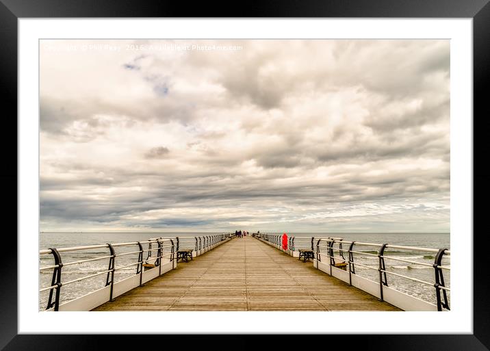 Looking down the pier Framed Mounted Print by Phil Reay